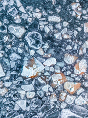 Aerial view of the ice texture broken into pieces of different shapes and sizes 