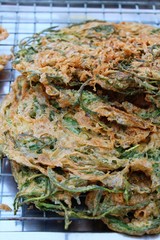 Fried acacia pennata omelette delicious at market