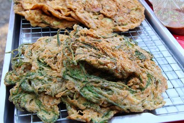 Fried acacia pennata omelette delicious at market