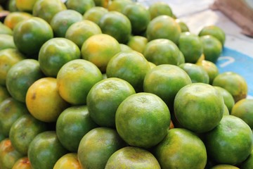 Ripe orange fruit is delicious at market
