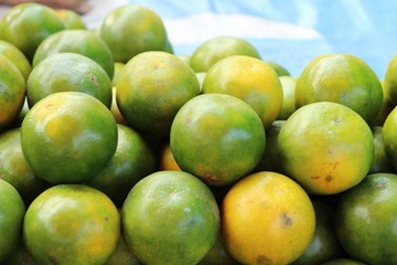 Ripe orange fruit is delicious at market