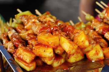 Grilled pork barbecue topped with sauce is delicious