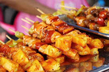 Grilled pork barbecue topped with sauce is delicious