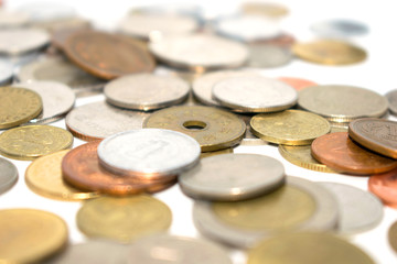 A photo of a large number of coins of different states.