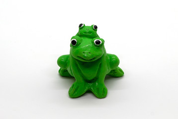 Statue of frog on a white background