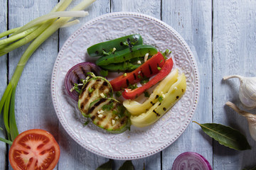 Grilled red, green and yellow peppers