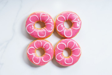 pink glazed donut