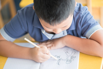 Students and teacher at school stury with happy  in the classroom