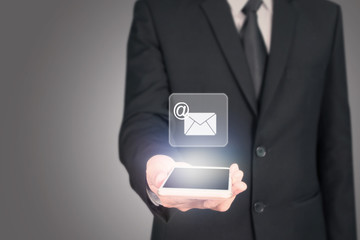 hand holding smartphone device and touching screen