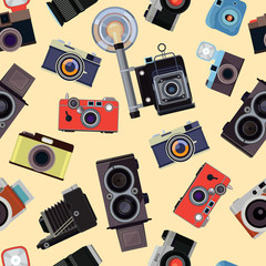 Cartoon seamless pattern with illustrations of retro photo cameras