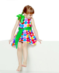 Girls looks because of the white obstacle.