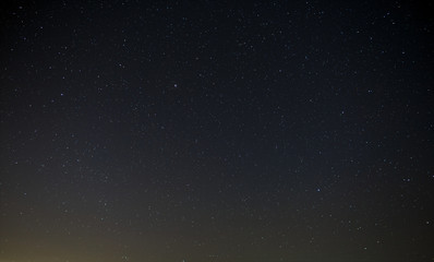 Night sky with a bright star of the Milky Way. Panoramic view of the starry space.