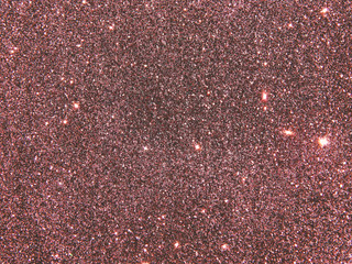 Textured background with brown glitter