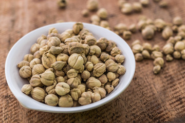 Close up of Amomum krervanh in bowl on wooden background