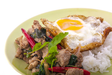 Rice topped stir-fried pork and basil with Fried egg