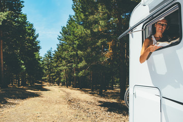 Girl reads a book in a motor home