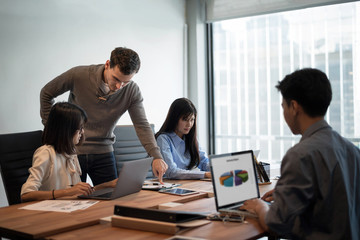 Fototapeta premium Boss is blaming young women employee about her jobs mistake.