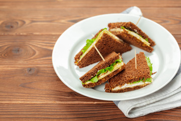 sandwich on a wooden table