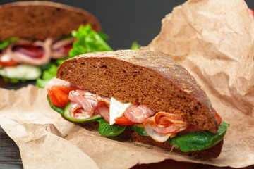 sandwich on a wooden table