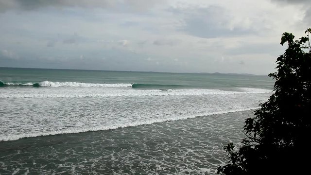 Surfers on north shore of Vieques Island, Puerto Rico