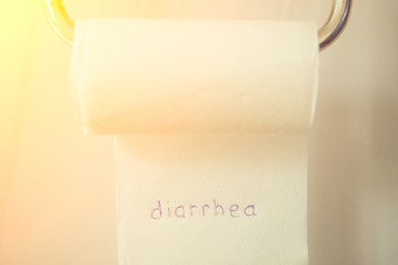 roll toilet paper. concept of diarrhea and indigestion of the stomach