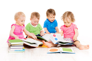 Fototapeta na wymiar Children Reading Books, Babies Early Education, Group of Kids one year old, Boys and Girls Isolated over White Background