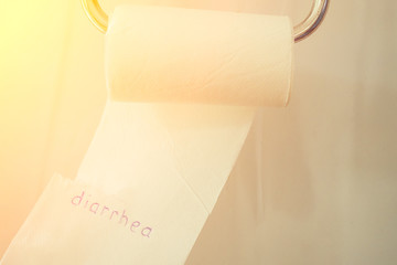 roll toilet paper. concept of diarrhea and indigestion of the stomach