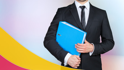 Unrecognizable businessman holding his papers