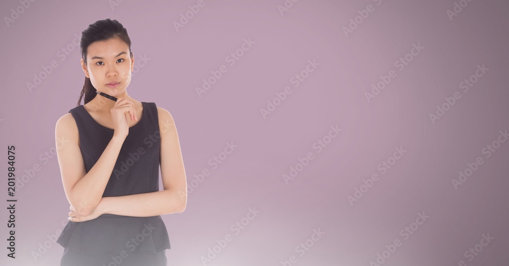 Wall mural Woman thinking in front of pink background