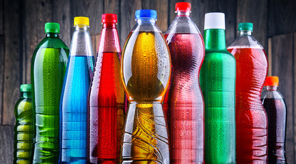 Plastic bottles of assorted carbonated soft drinks