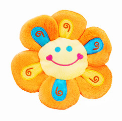 Plush colourful flower with smiling face for little kids isolated on the white background. Soft orange and yellow plush sun for small kids for playing. Children plush toy.