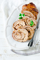 Baked roll from a turkey thigh with a grain mustard