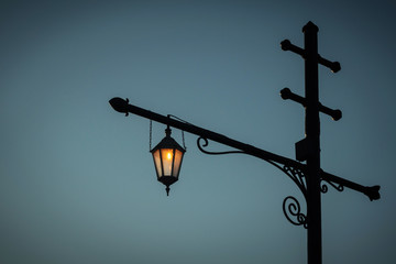 vintage street lantern against a dark sky