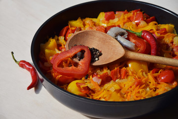  Sliced ​​vegetables close-up fried in a frying pan