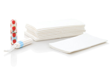A packet of tissues with 2 tampons isolated on the white background. Hygienic tissues for disposable usage. Napkins easily recyclable. Women´s tampons in the package with strawberries and tissues