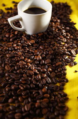Coffee beans and cup