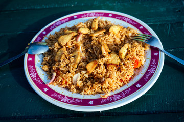 breakfast on the table. invigorating coffee and a plate of rice