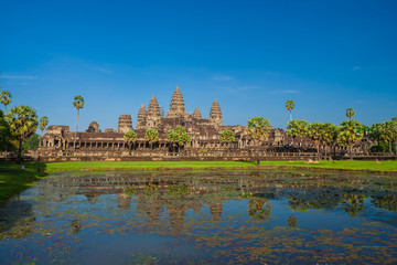Fototapeta na wymiar The spectacular front side with the lily pond of the main complex of Angkor Wat in Siem Reap, Cambodia. 