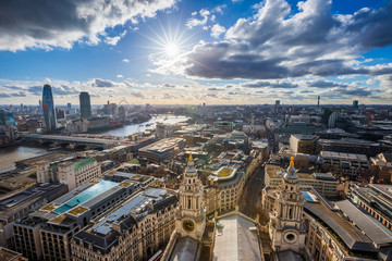 London, England - Panoramic skyline view of London taken from St. Paul's Cathedral with iconic red...