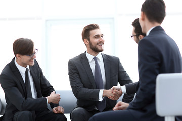 handshake business people in the office.