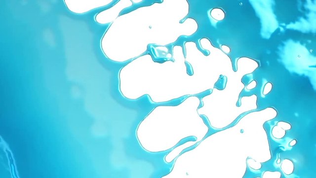 Filling the frame with blue fluid or liquid in slow motion. Alpha