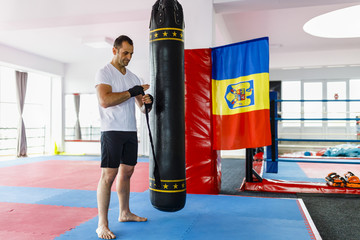 kickboxer is preparing for the training