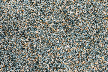 small stones background blue and yellow