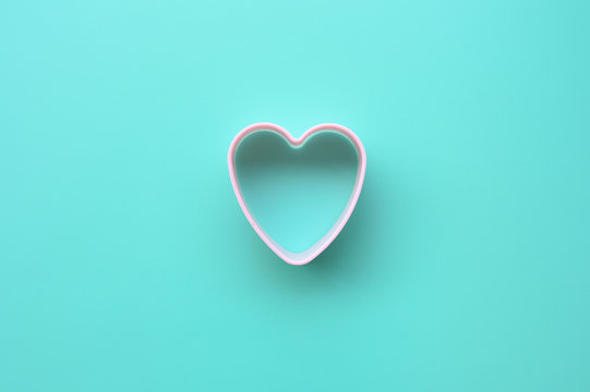 Close up of heart shaped of dessert plastic mold for background