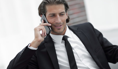 business man talking on smart phone.