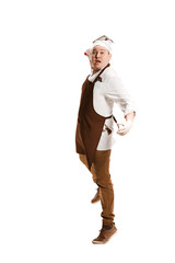 Angry aggressive butcher posing with a cleaver isolated on white background