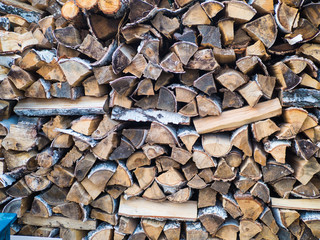Background of wooden logs. Year rings. Pile wood. Deforestation theme. Wood industry. Chopped wood....