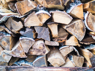 Stacked Logs Texture, Natural Background. Cross section of the timber, firewood stack for the background.