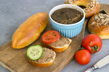 Sandwiches with liver pate and vegetables.