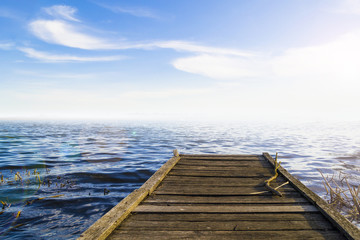 Fototapeta na wymiar Fantastic view of the wooden pier in the lake. Scenery background